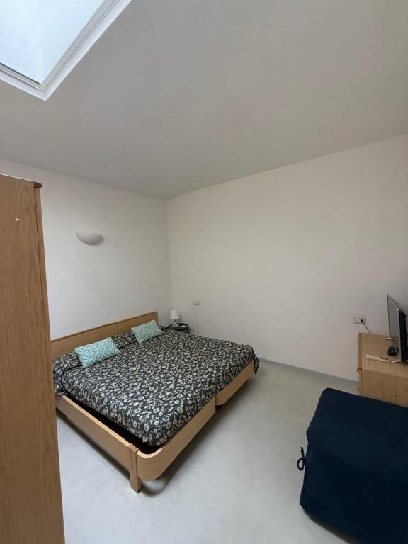 Postel nebo postele na pokoji v ubytování Aviotel Residence