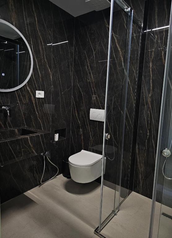 Koupelna v ubytování Hotel Agron