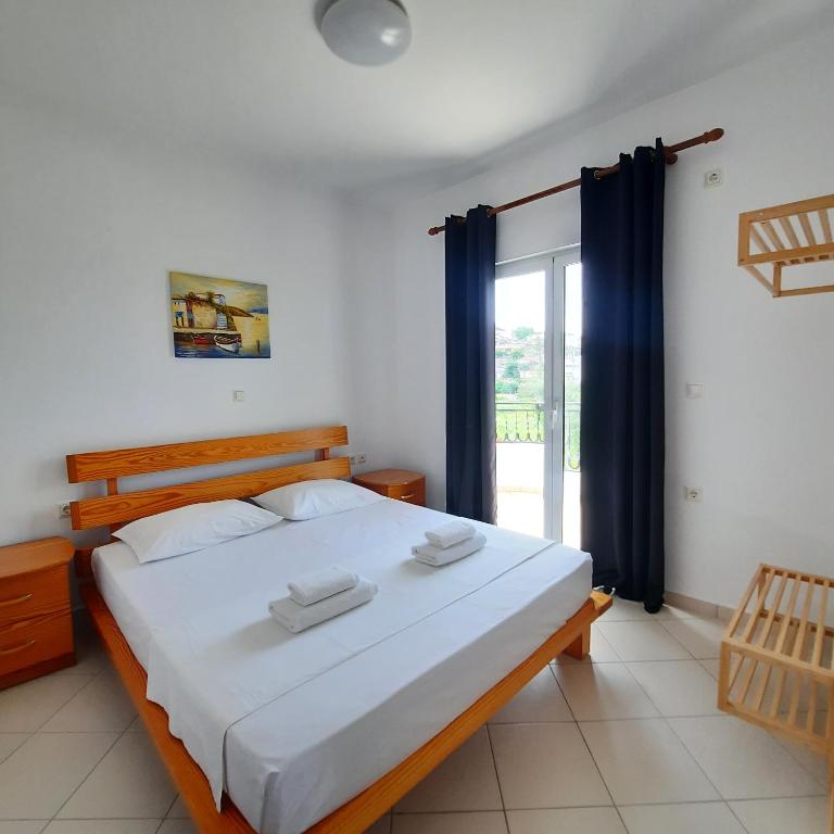Кровать или кровати в номере Amarildo Hotel