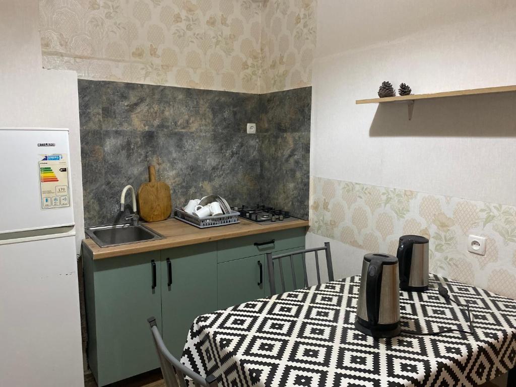 Kuchyň nebo kuchyňský kout v ubytování Hotel Prime