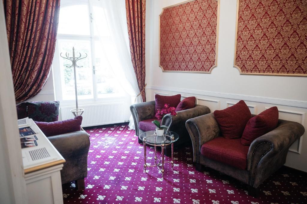 Posezení v ubytování Alisa Hotel