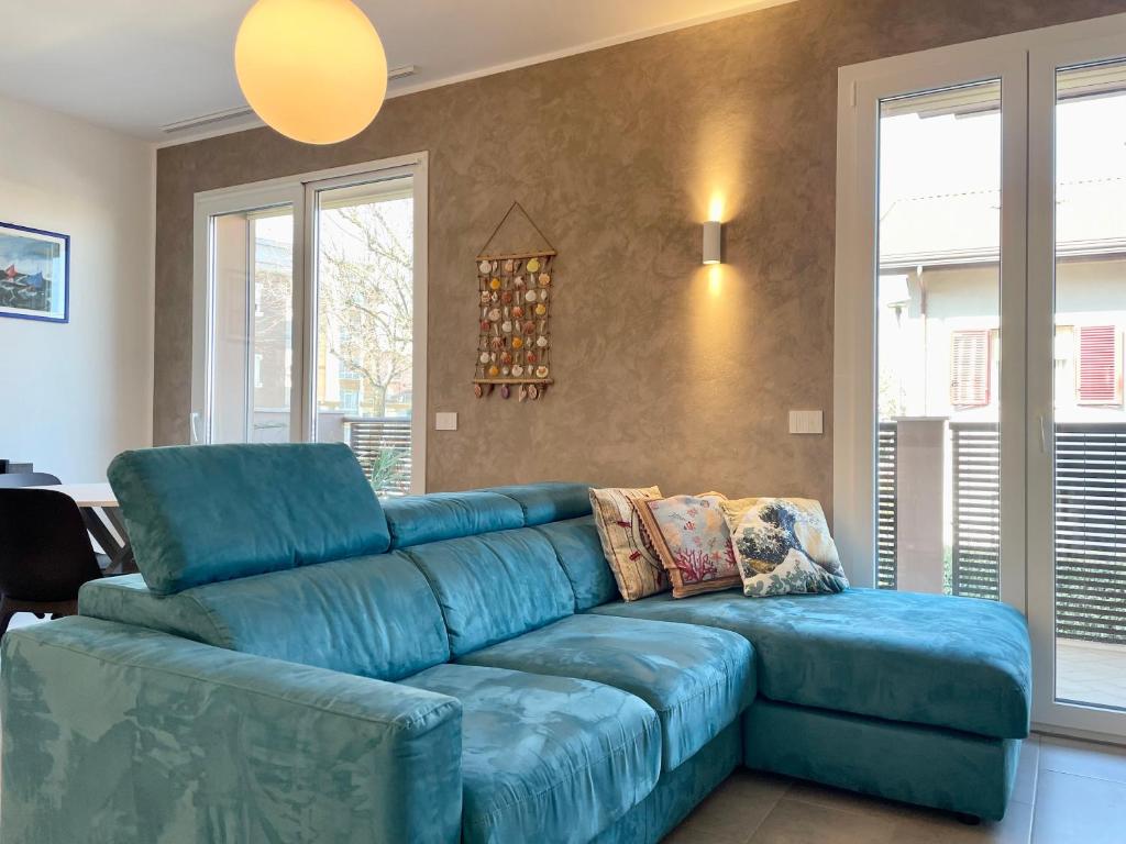Ruang duduk di Bilocale con terrazzo e garage – Casa Ondina