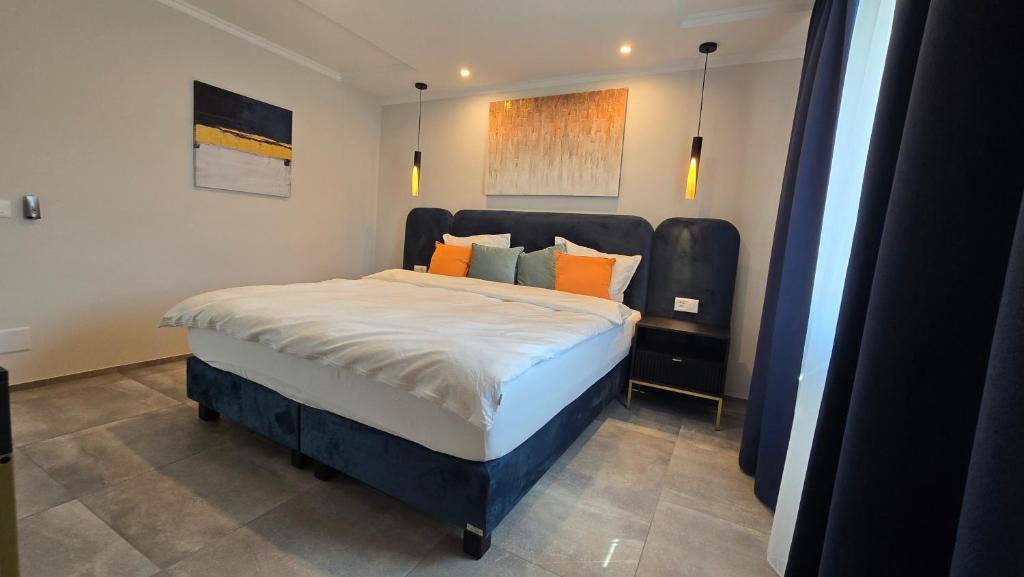Postel nebo postele na pokoji v ubytování Apartment BugerStay