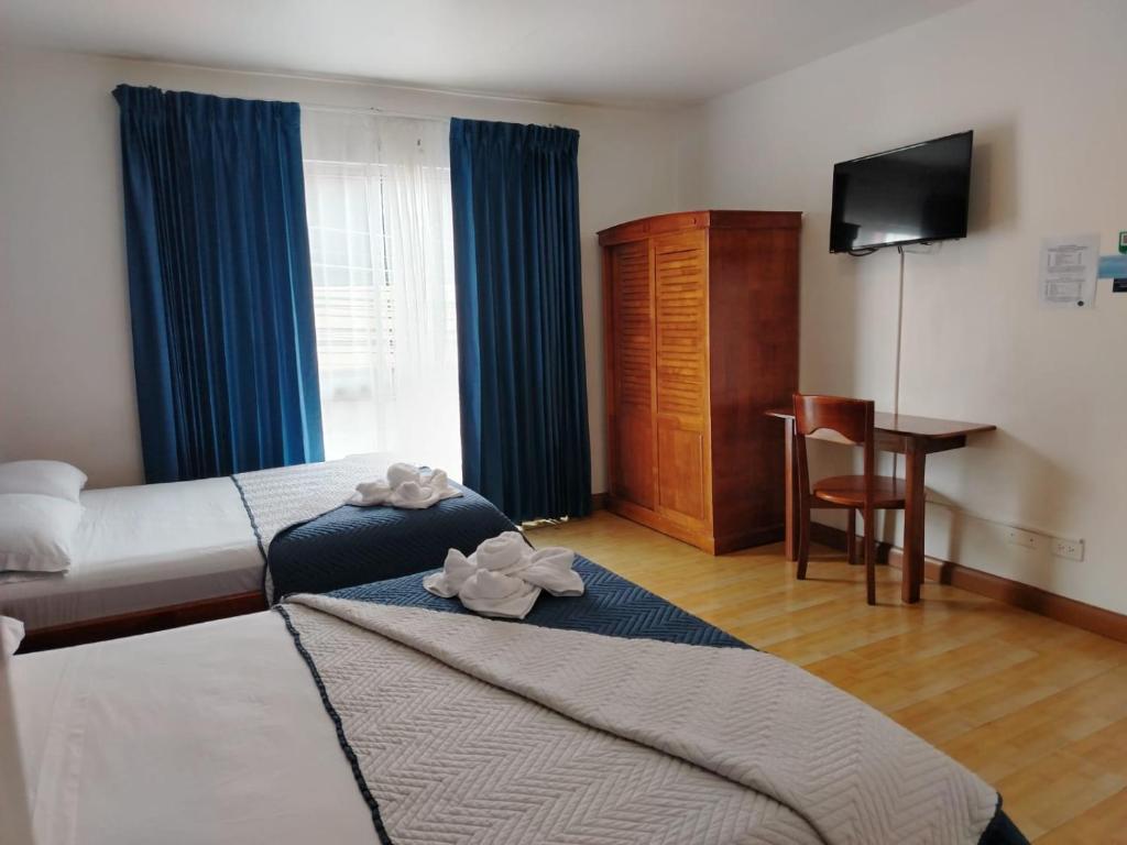 Postel nebo postele na pokoji v ubytování Park View Hotel & Restaurant