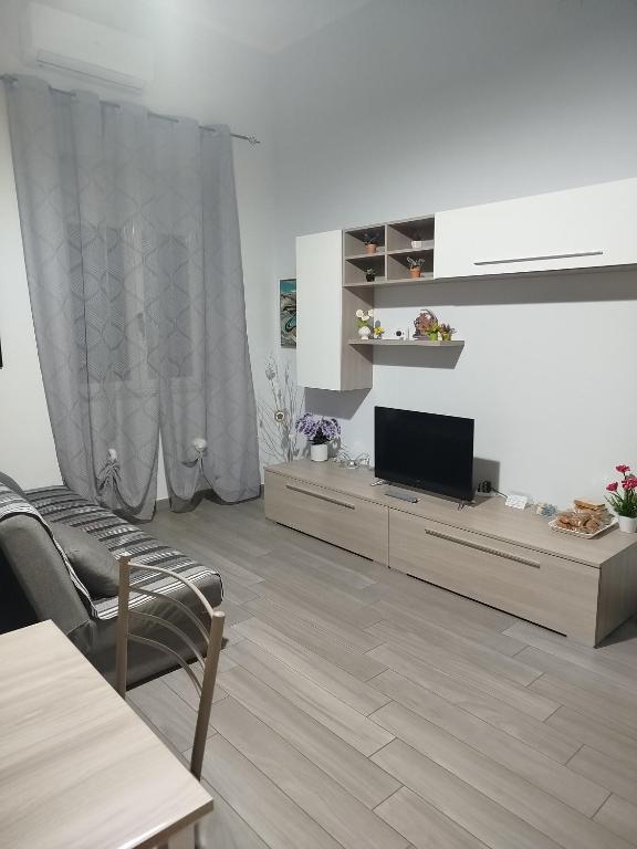 TV a/nebo společenská místnost v ubytování CAMARDA HOME