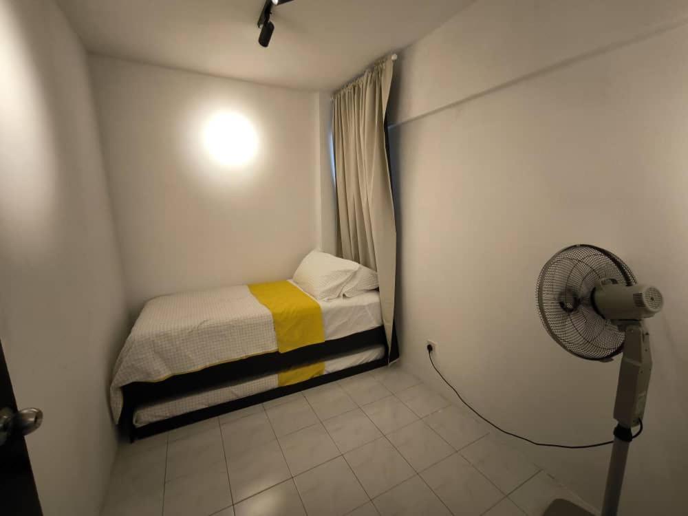 Postel nebo postele na pokoji v ubytování Hermoso Bukit Beruntung