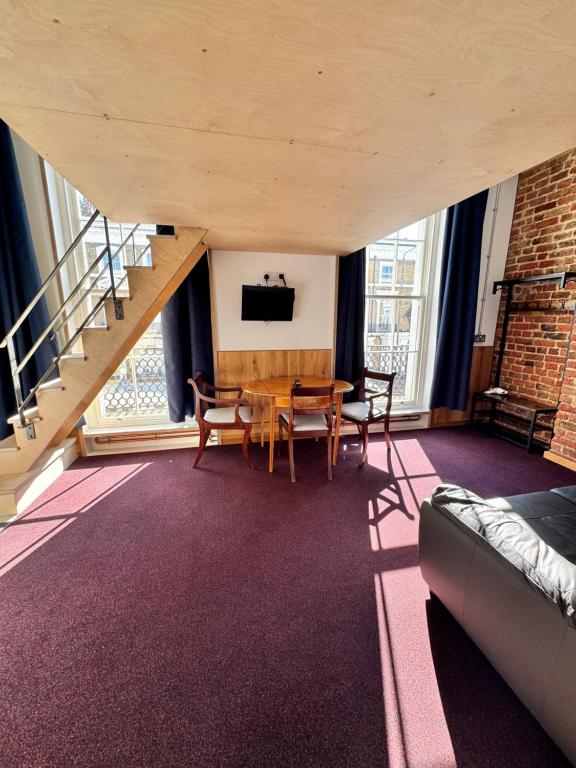 TV a/nebo společenská místnost v ubytování Hotel 22
