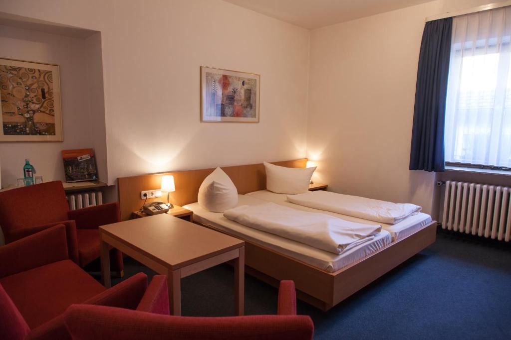 Postel nebo postele na pokoji v ubytování Akzent Hotel Schranne