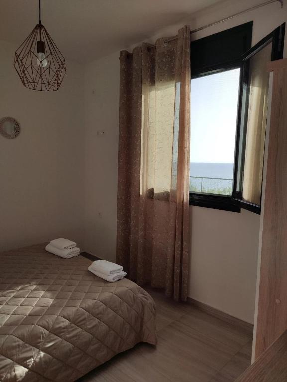 Postel nebo postele na pokoji v ubytování Panorama Beach