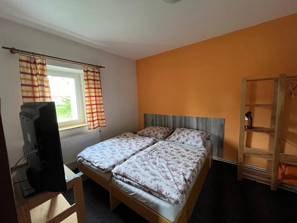 Postel nebo postele na pokoji v ubytování Apartmány Forest