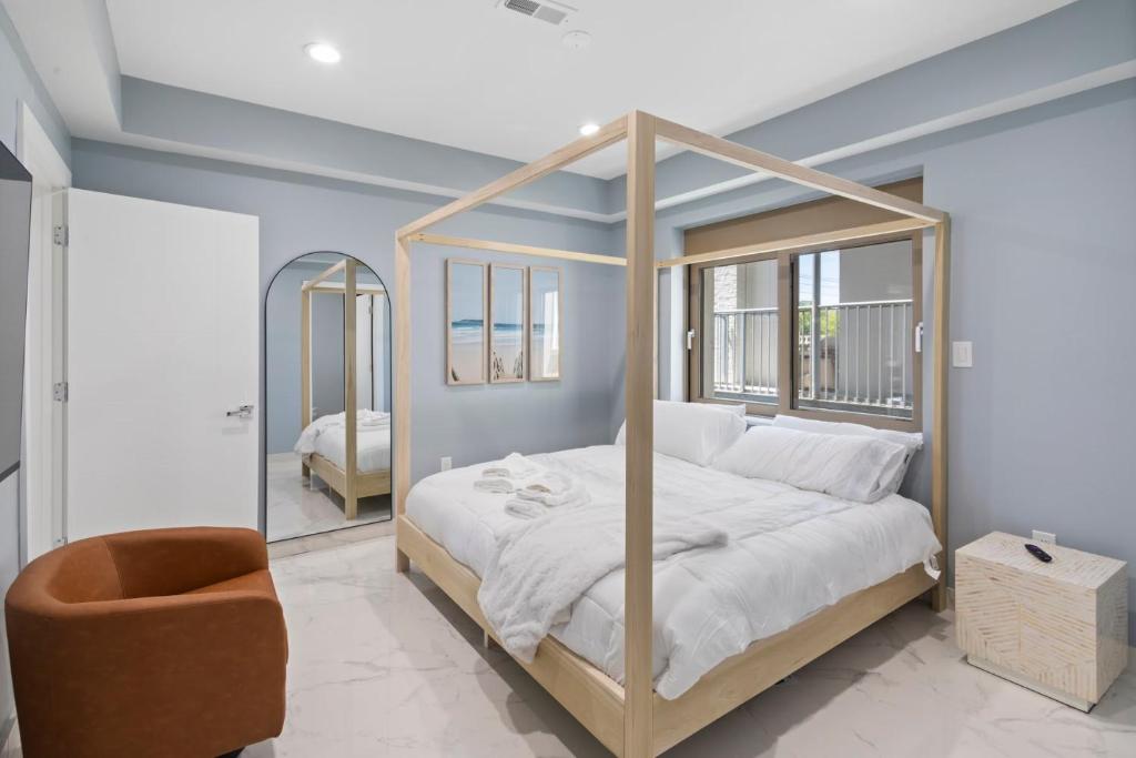 Katil atau katil-katil dalam bilik di Ammos Luxury Living- Mykonos Suite