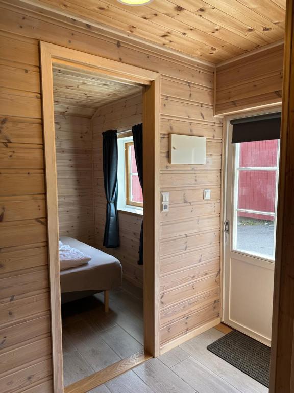 Postel nebo postele na pokoji v ubytování Haugo Utleige Lodge