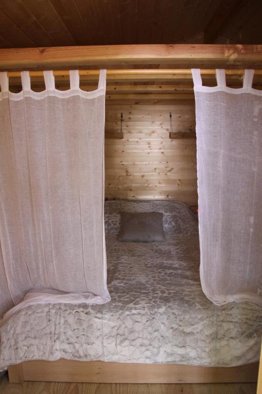 Postel nebo postele na pokoji v ubytování Lodging Le Lac