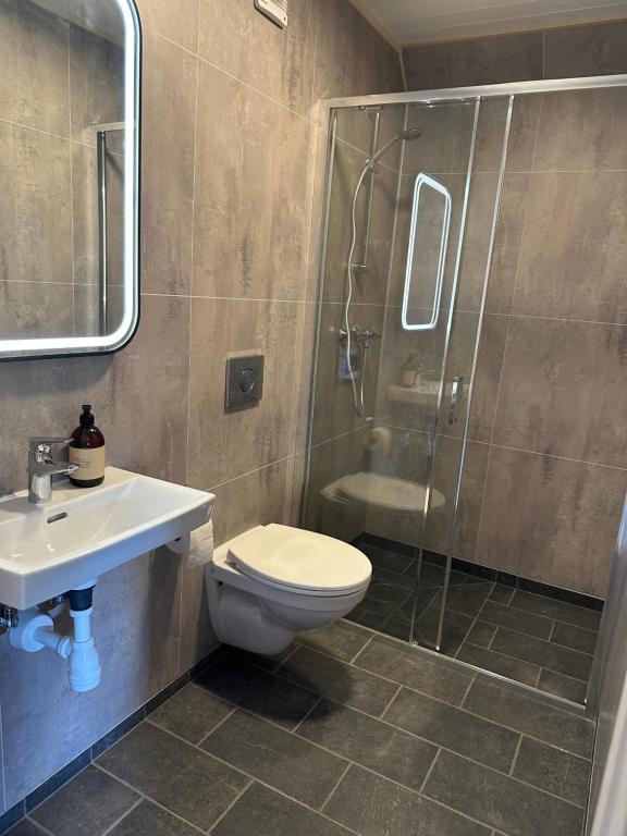 Koupelna v ubytování Haugo Utleige Lodge