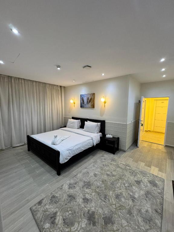 Postel nebo postele na pokoji v ubytování New Star Zamalek Hotel