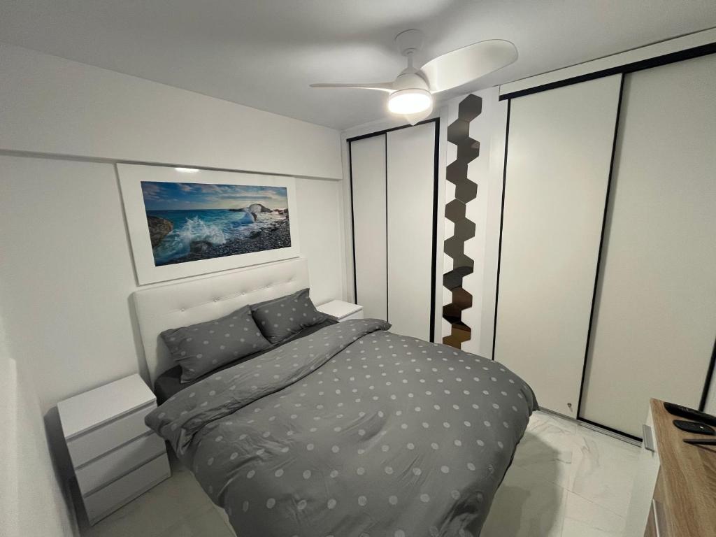 a bedroom with a bed in a white room at Luxuery View in Calpe