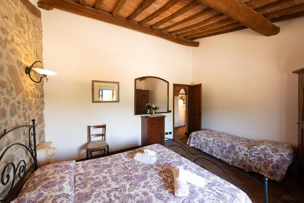 Postel nebo postele na pokoji v ubytování Casa Elisabetta