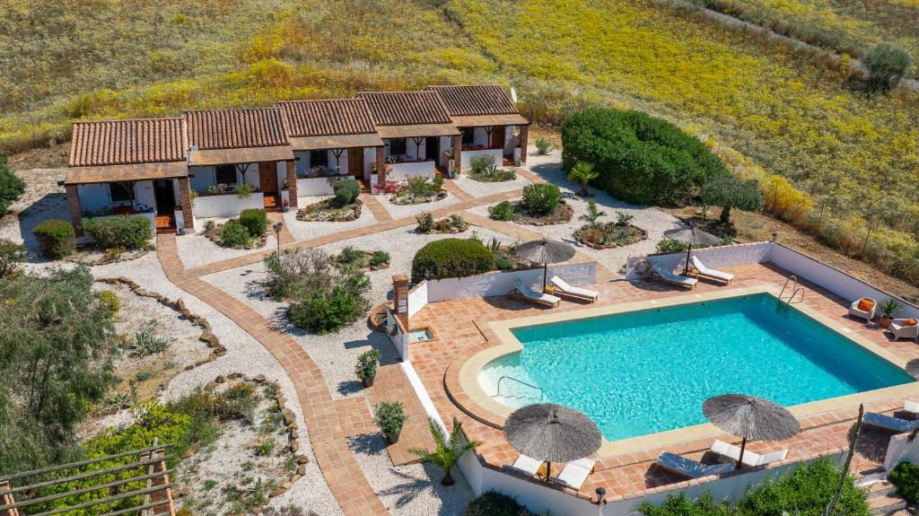 The swimming pool at or close to Boutique B&B Cortijo Valverde Álora