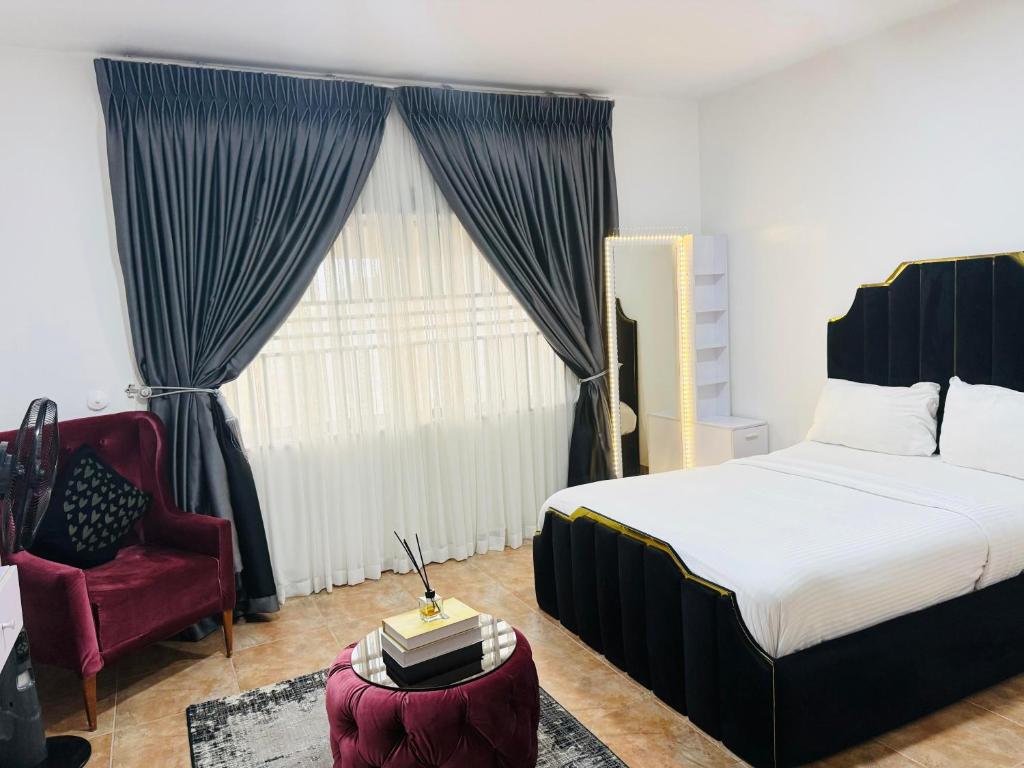 Postel nebo postele na pokoji v ubytování Pearl Luxe Homes