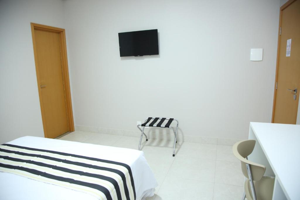 Postel nebo postele na pokoji v ubytování Ventura Hotel