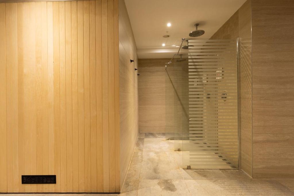 Koupelna v ubytování Royal Ariston Hotel