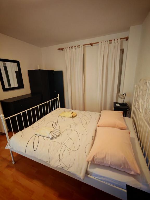 Postel nebo postele na pokoji v ubytování Rooms Carija
