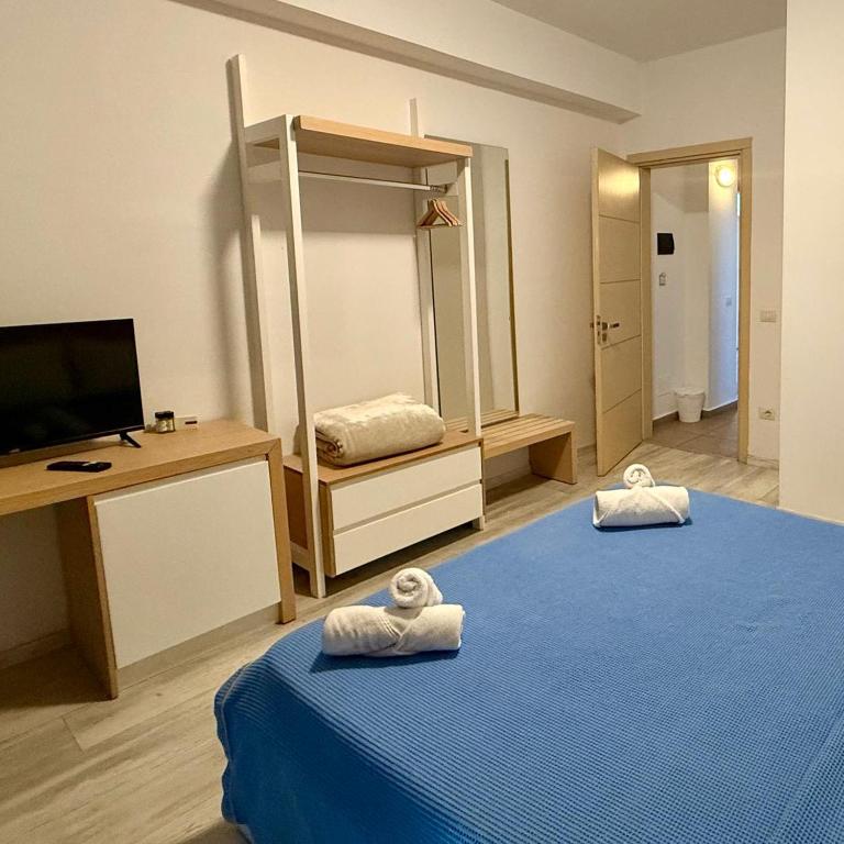 Postel nebo postele na pokoji v ubytování Hotel Stolis