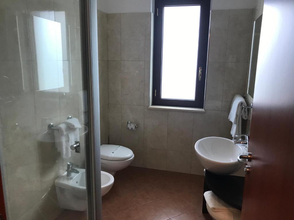 Gullo Hotel - Quarto Quádruplo