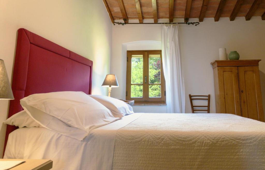 Postel nebo postele na pokoji v ubytování Appartamento con terrazza privata e giardino vicino a Pisa e Firenze