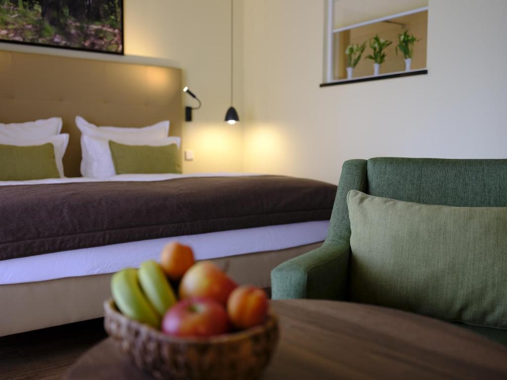 Postel nebo postele na pokoji v ubytování Farmer Hotel Basedow
