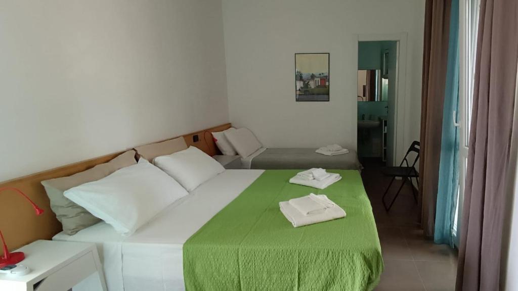 Postel nebo postele na pokoji v ubytování Casa Eduardo