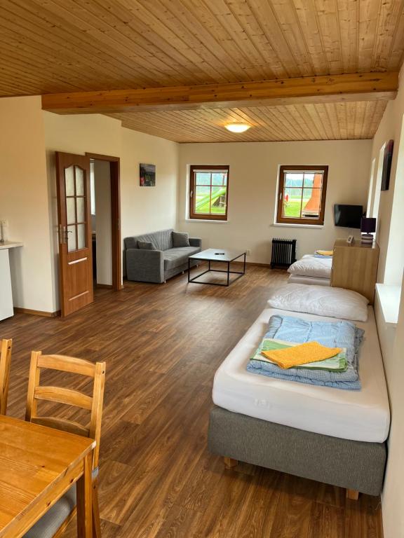 Postel nebo postele na pokoji v ubytování Pension Hofberg