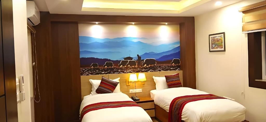 Postel nebo postele na pokoji v ubytování Hotel Sherpani