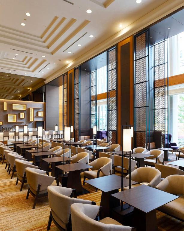 Posezení v ubytování De Hotel Belwood Near IGI Delhi Airport