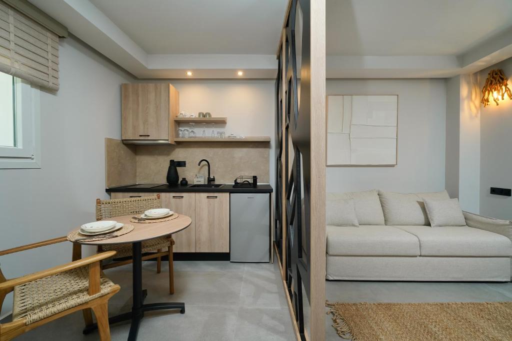 A kitchen or kitchenette at Apollonia by Stone Village