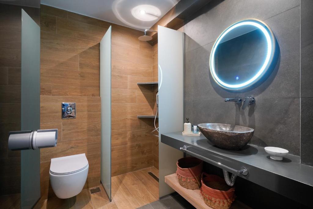 A bathroom at Apollonia by Stone Village