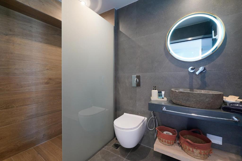 A bathroom at Apollonia by Stone Village