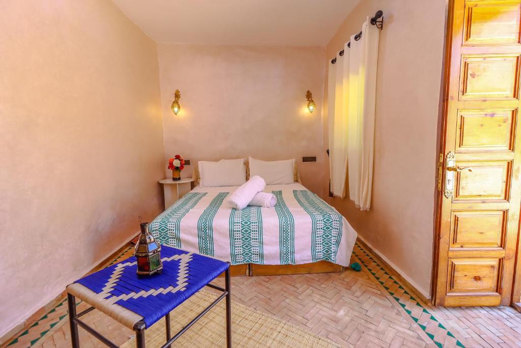 Postel nebo postele na pokoji v ubytování Maison D'hôte Zomorroda