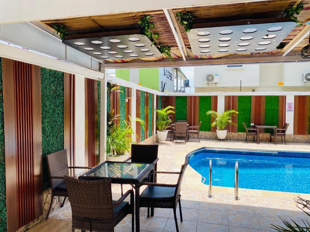 Bazén v ubytování Presken Hotel @Oniru nebo v jeho okolí