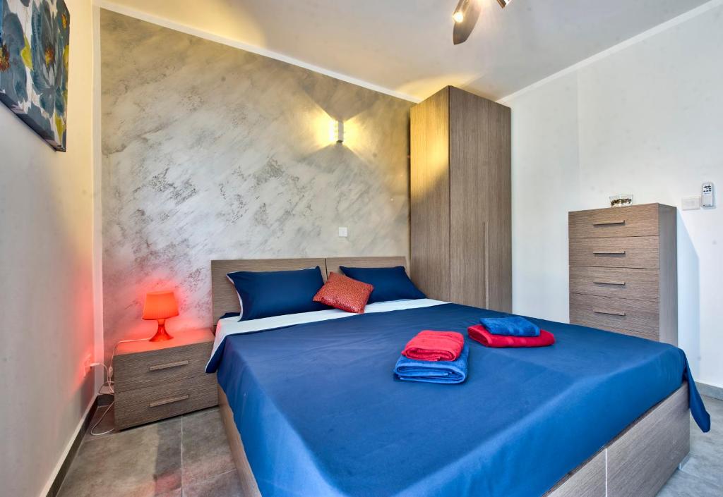 Postel nebo postele na pokoji v ubytování Central Suites