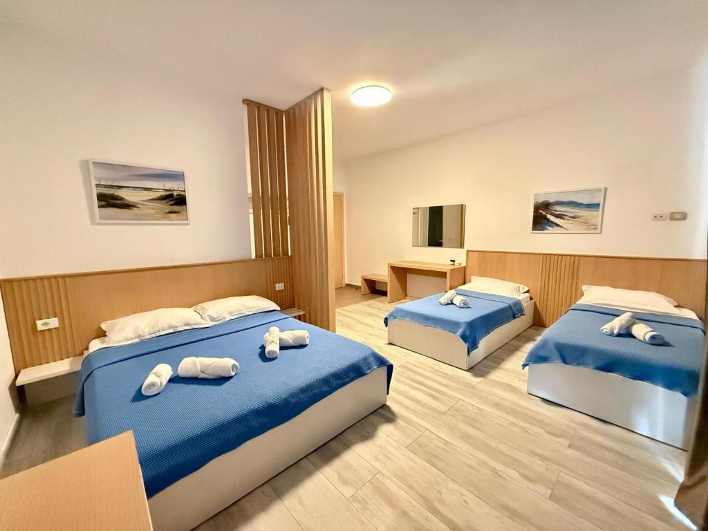 Postel nebo postele na pokoji v ubytování Hotel Stolis