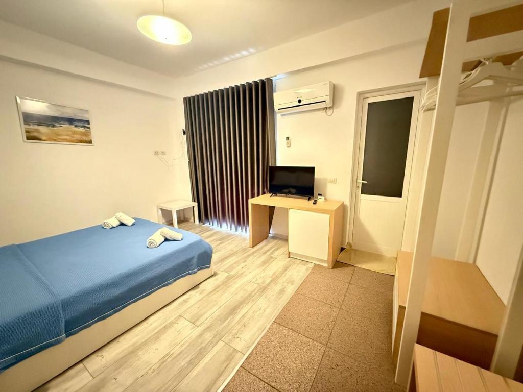 Postel nebo postele na pokoji v ubytování Hotel Stolis