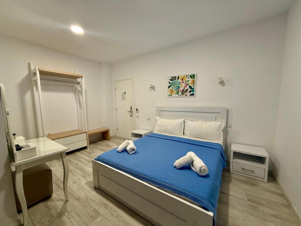Postel nebo postele na pokoji v ubytování Hotel Stolis