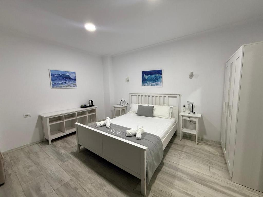 Postel nebo postele na pokoji v ubytování Hotel Stolis