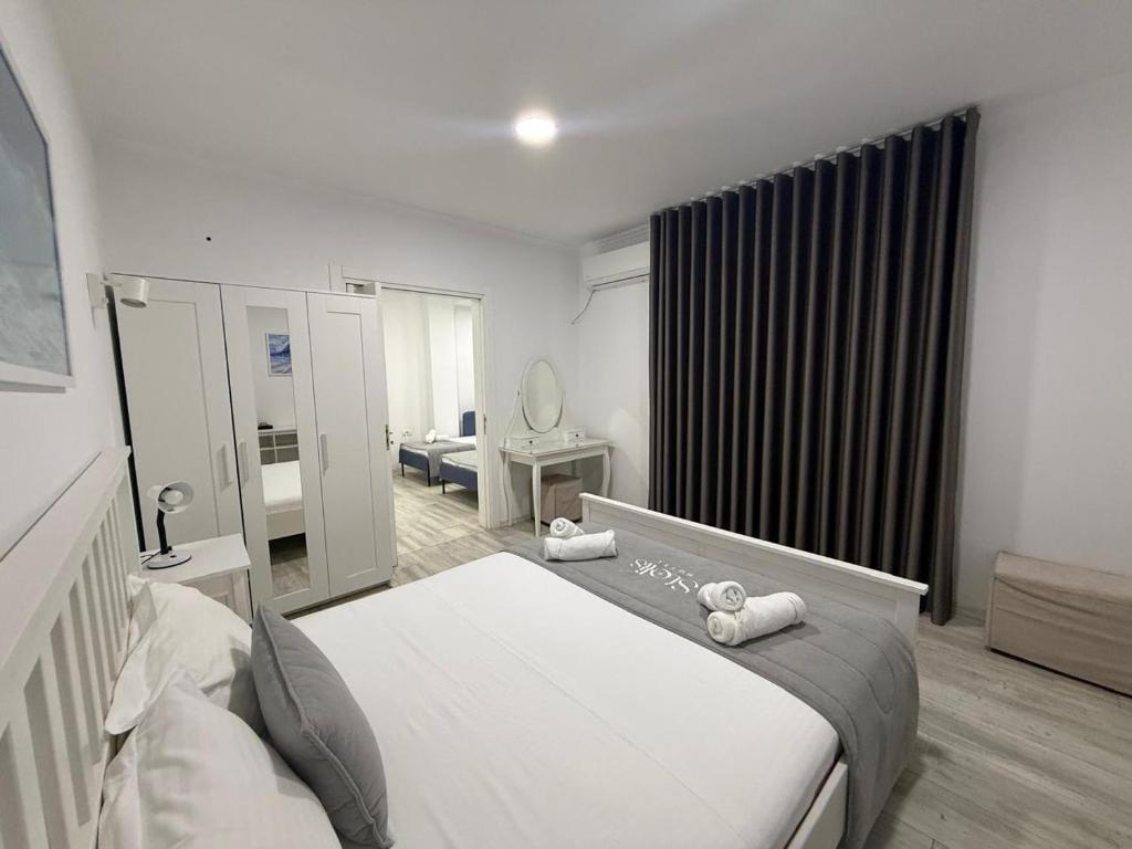 Postel nebo postele na pokoji v ubytování Hotel Stolis