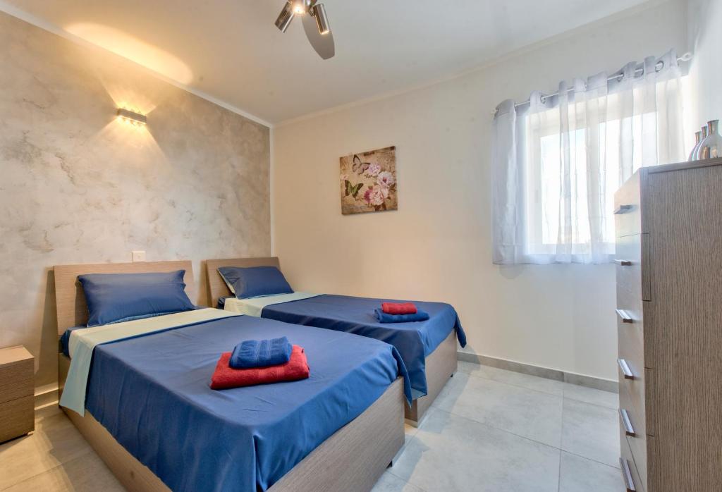 Postel nebo postele na pokoji v ubytování Central Suites