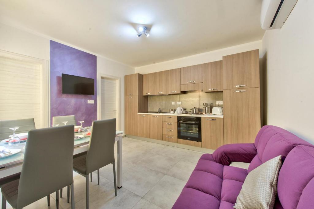 Kuchyň nebo kuchyňský kout v ubytování Central Suites