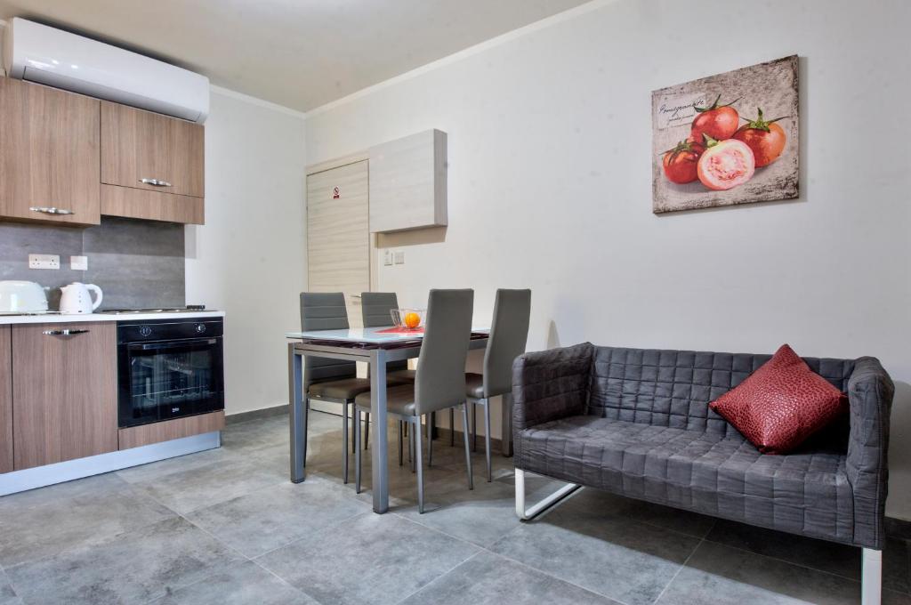 Kuchyň nebo kuchyňský kout v ubytování Central Suites