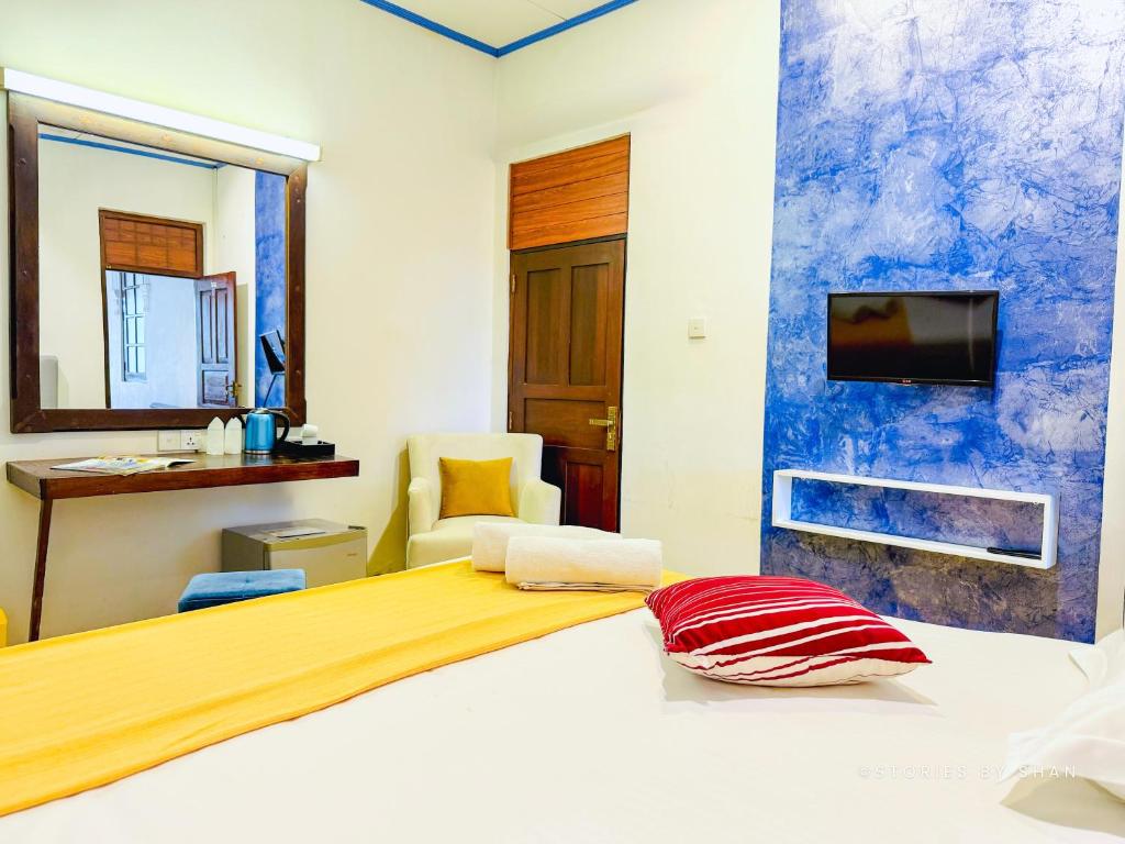 Postel nebo postele na pokoji v ubytování Hotel Dorset