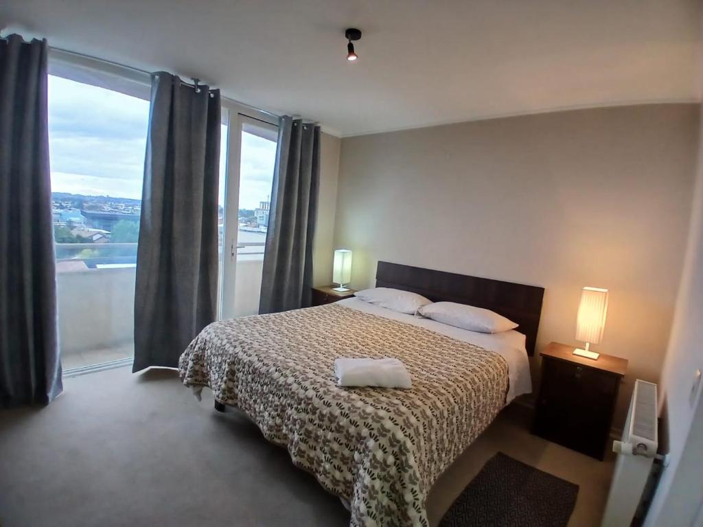 Ένα ή περισσότερα κρεβάτια σε δωμάτιο στο San Ramón 807